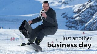 Snowboarding 133,2 kph in a business suit!