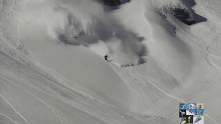 Snowboarding and skis  Running from an avalanche