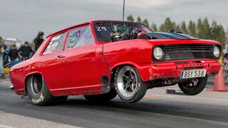 Turbo Opel SWITCHES LANES Doing a Wheelie…Guy is CRAZY!