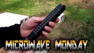 Loaded Glock 18 Mag in a Microwave
